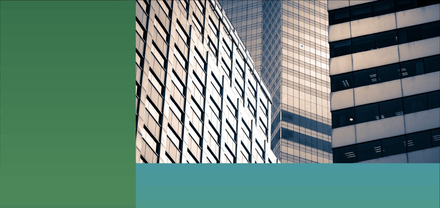 Low-angle photo of office buildings